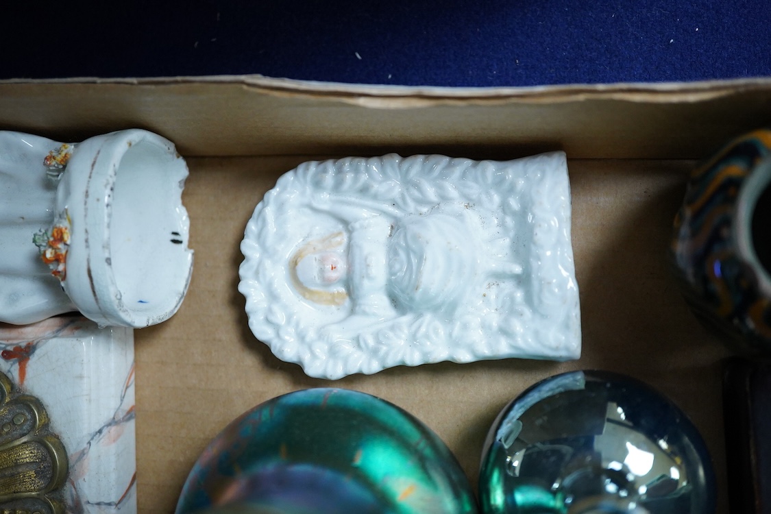 A collection of sundry items to include a carved bust of Nefertiti, crystal specimens, Roman style vase with trailed decoration and a table bell